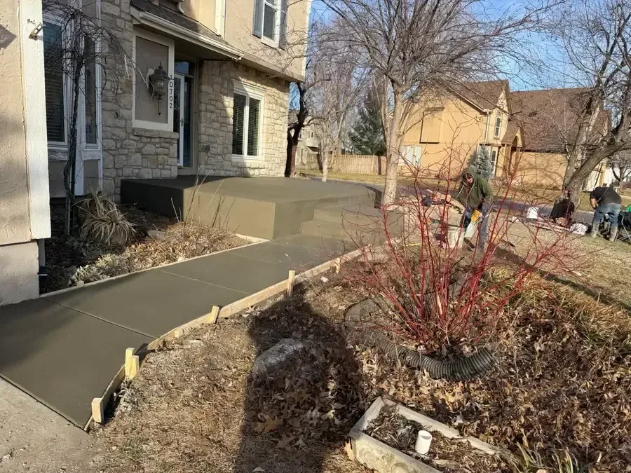 Finished stamped concrete patio in Kansas City backyard